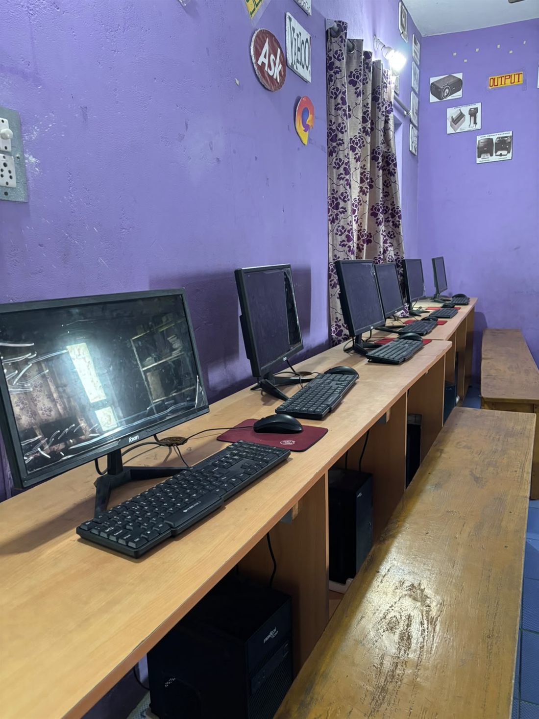 The computer laboratory, a row of machines along the bench